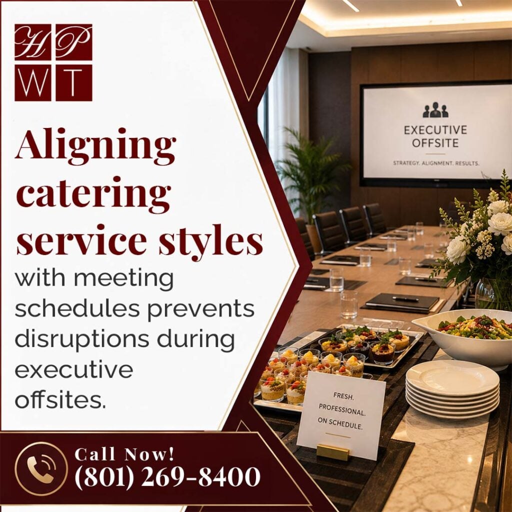 How Do You Plan Corporate Catering for an SLC, UT, Leadership Offsite? 1 A catering table with individual parfait desserts, fresh salad, and plates set up in front of an executive boardroom table and presentation screen.